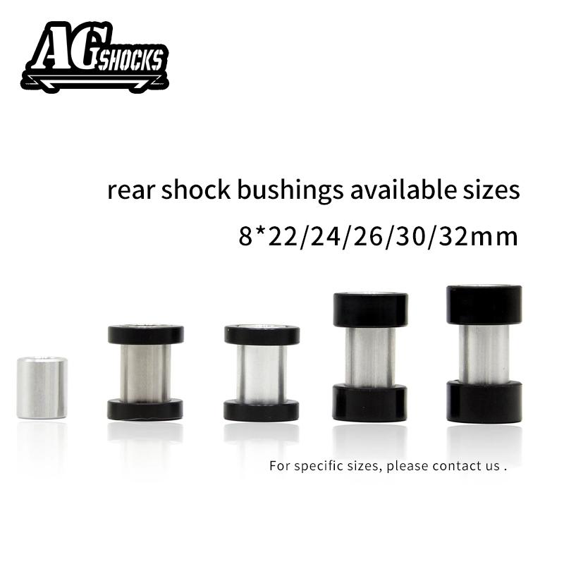 Rear shock mounting hardware with bushing and spacers